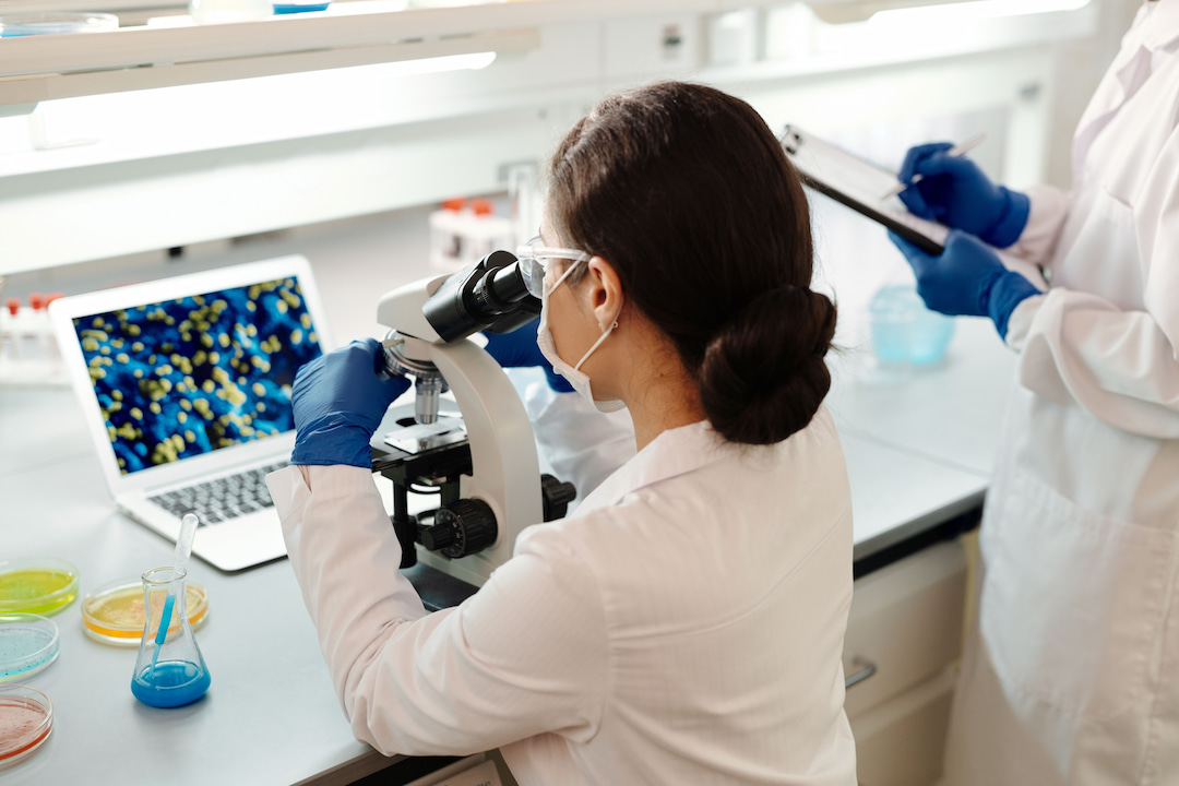 Clinical research team reviewing study documents in a professional research environment